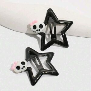 2 skull star hair clips